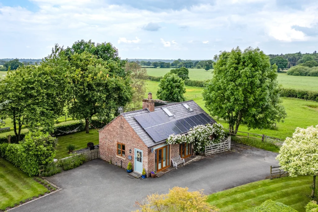 Traditional brick barn conversion cottage with landscaped garden in Chester