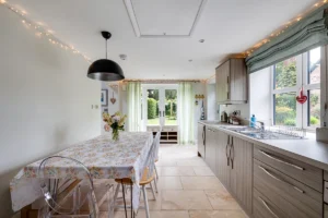Modern country kitchen in renovated barn conversion property