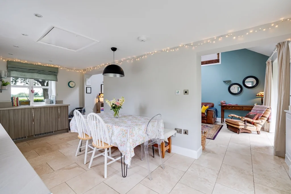 Open plan dining area within cottage renovation in Cheshire