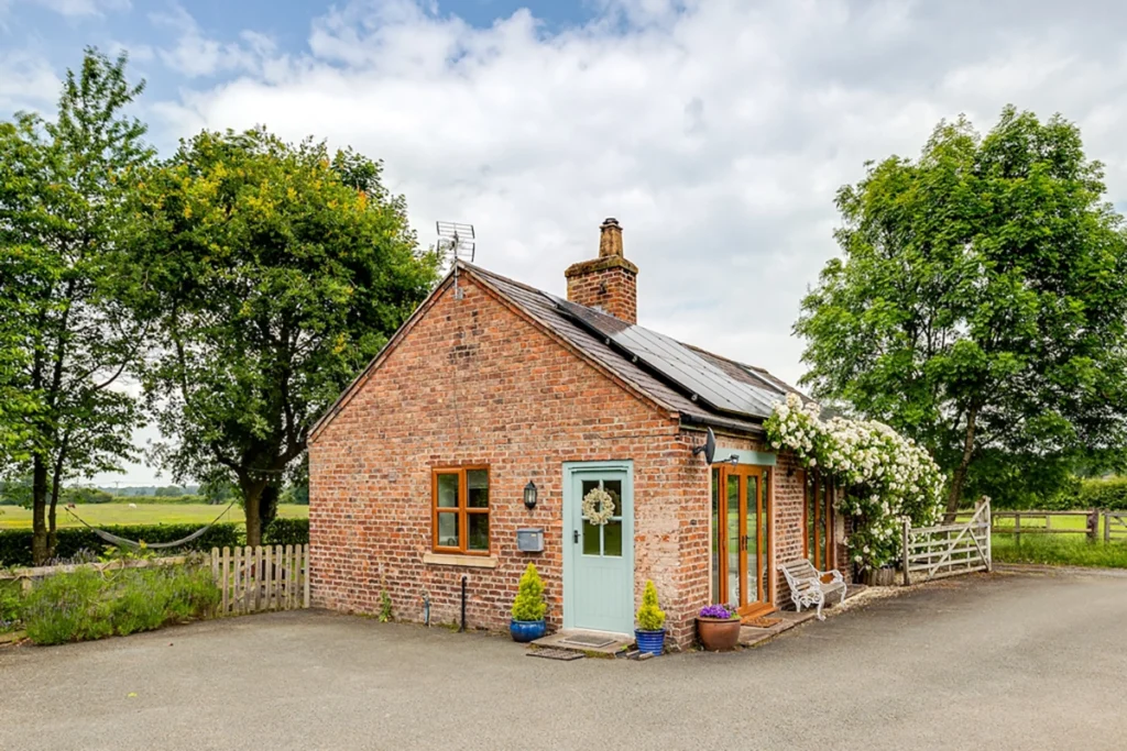 Rural brick cottage renovation with traditional character in Cheshire